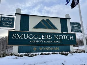 Welcome sign to Smugglers' Notch Resort in VT