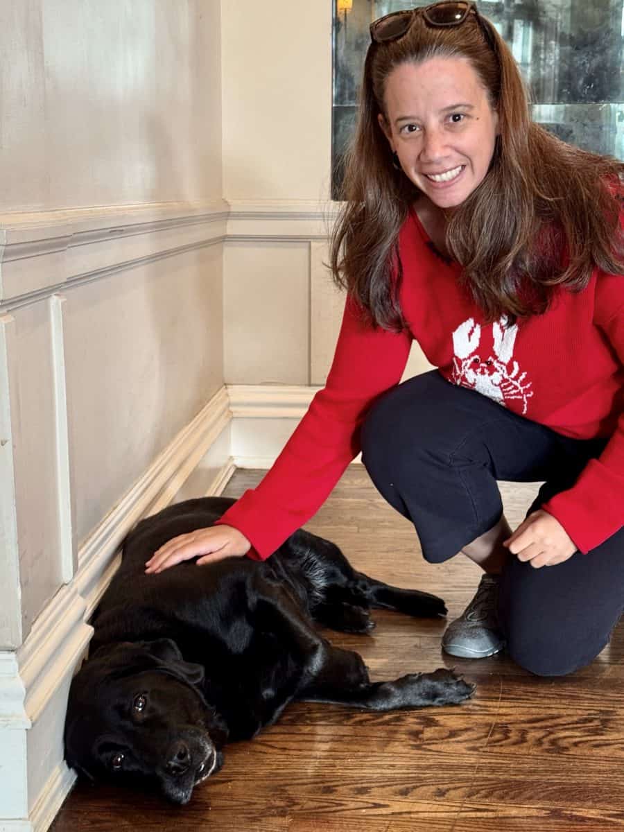 petting Leila, the concierge dog at the Algonquin Resort in St Andrews, New Brunswick Canada