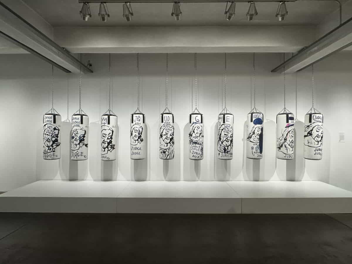 Warhol’s collaboration with Jean-Michel Basquiat entitled “In Focus”, which utilizes ten large punching bags artwork at the Andy Warhol Museum in Pittsburgh, PA