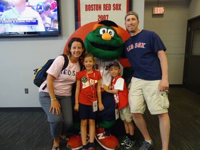 posing with Wally at a Red Sox game