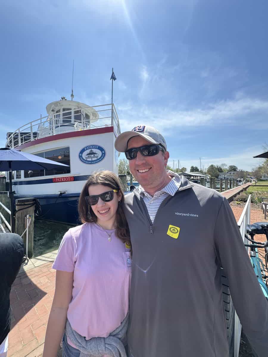 posing in front of the Patriot boat at the Chesapeake Bay Maritime Museum in St Michaels, MD