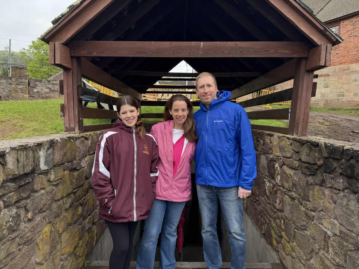 posing in front of the entrance to the mine at Old New-Gate Prison and Copper Mine in East Granby, CT