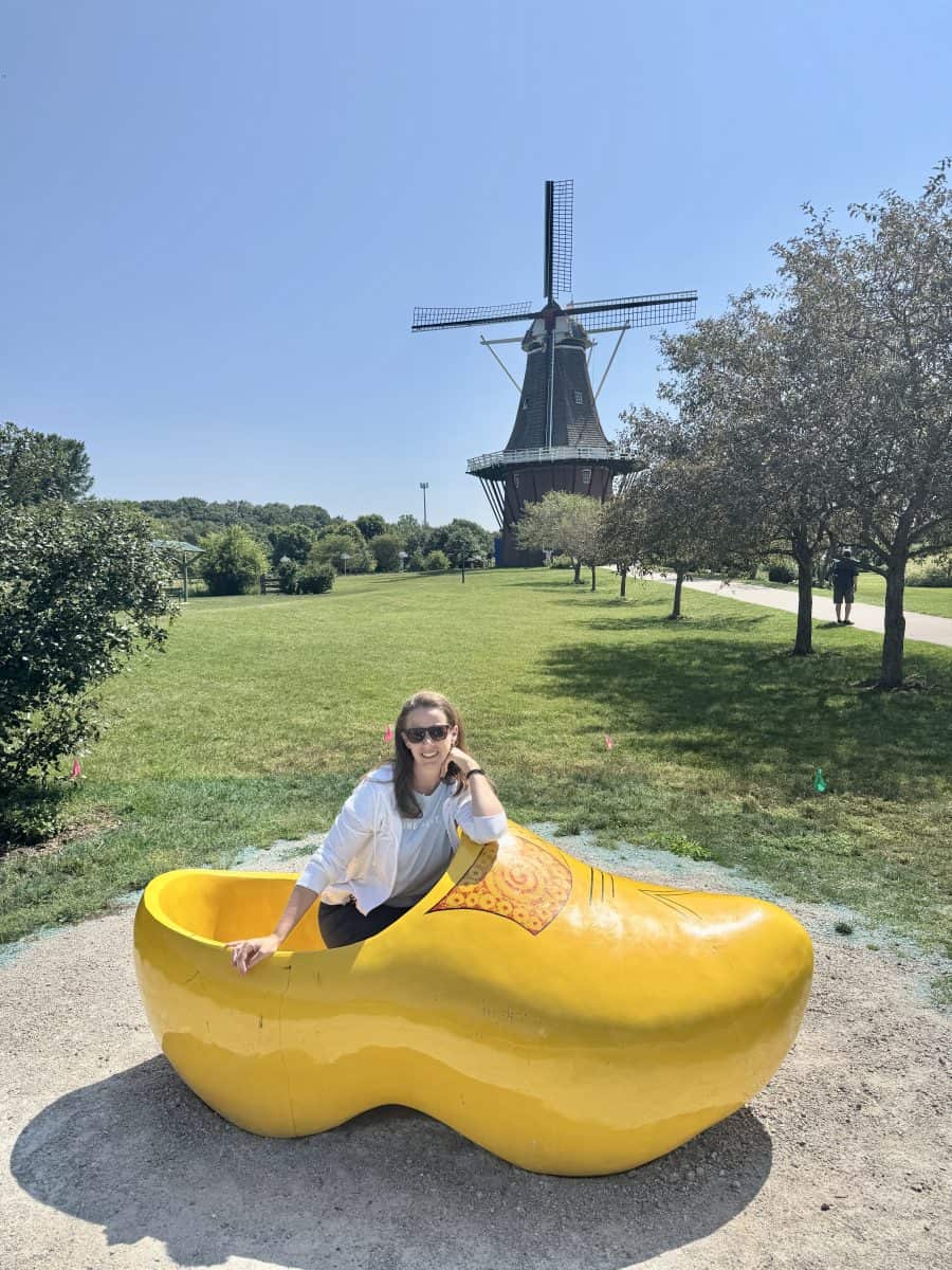 posing inside a Dutch shoe at at Windmill Island Gardens in Holland, Michigan