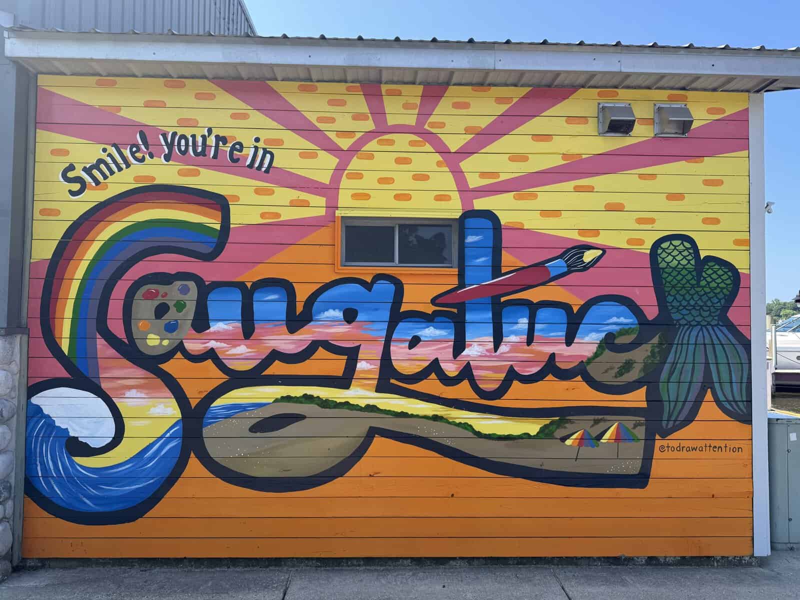 painted Saugatuck sign in Saugatuck MI