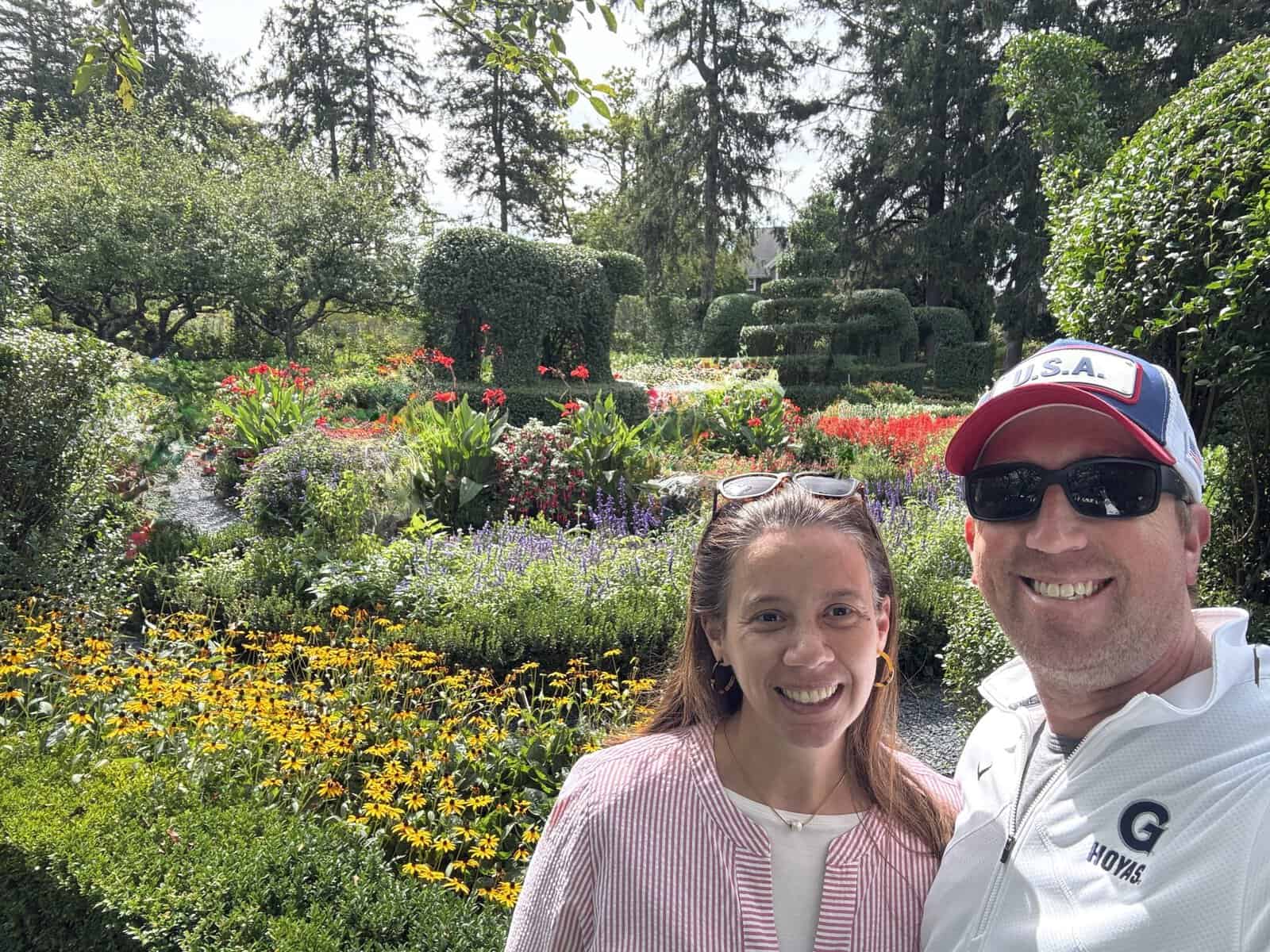 posing in front of an animal topiary at the Green Animals Topiary Garden in Portmouth RI